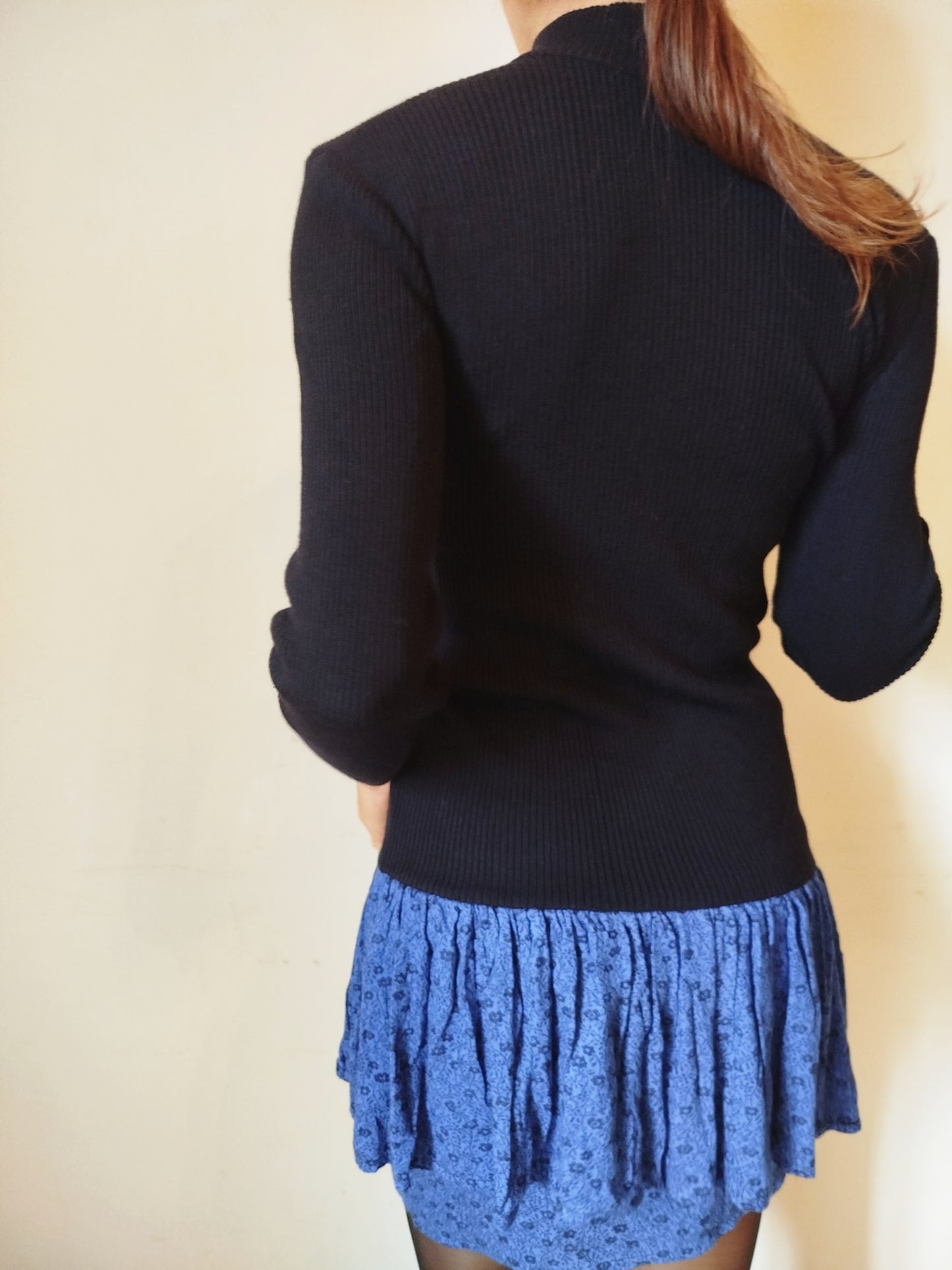 Vestito in maglia con gonnellina a pieghe